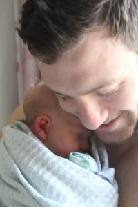 Baby Taj Thomas and dad Jono at Mercy Hospital for Women